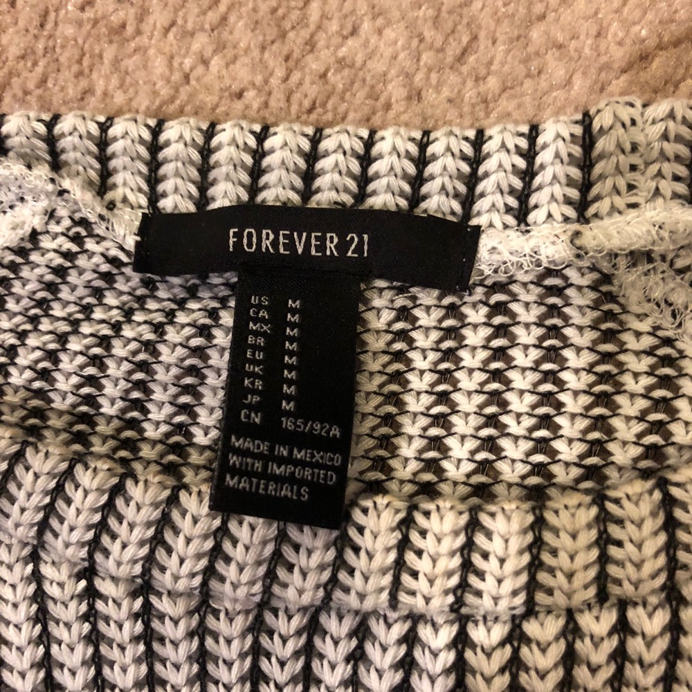 Cropped black and white herringbone sweater